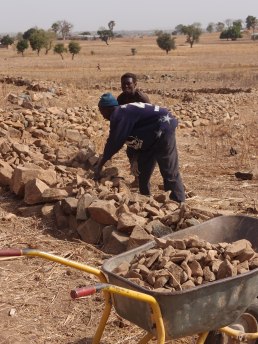 Farmers building stone bunds, Upper East Region, Ghana